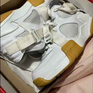 Nike raid size 8 white with gum bottom gently worn.